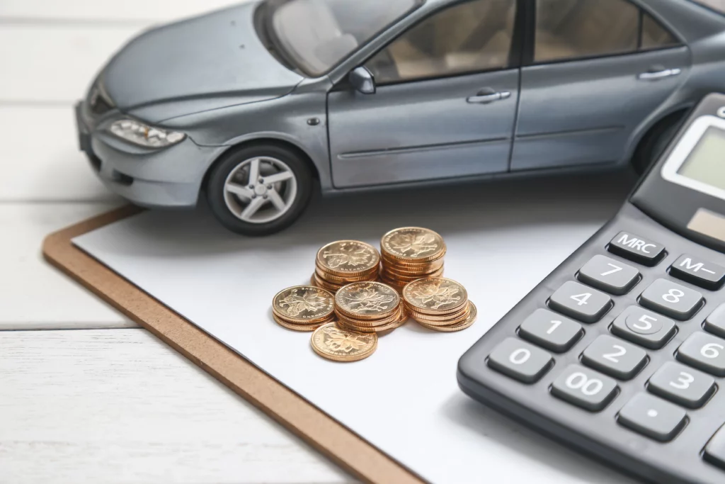 car model calculator coins white table