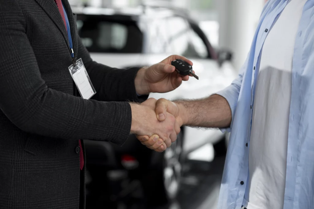 close up customer with business person car dealership